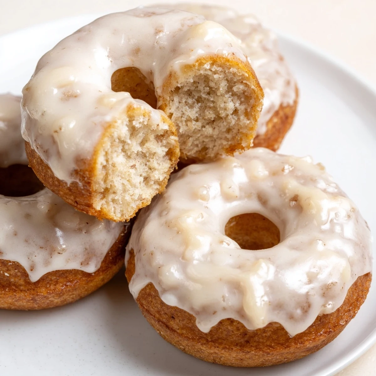Fresh Banana Donuts cooling on a wire rack, golden, sweet banana aroma